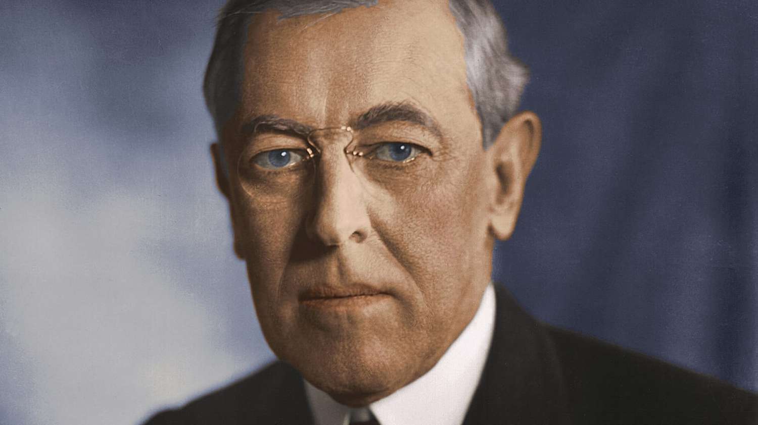 Woodrow Wilson, the 28th U.S. President, in a reflective pose.